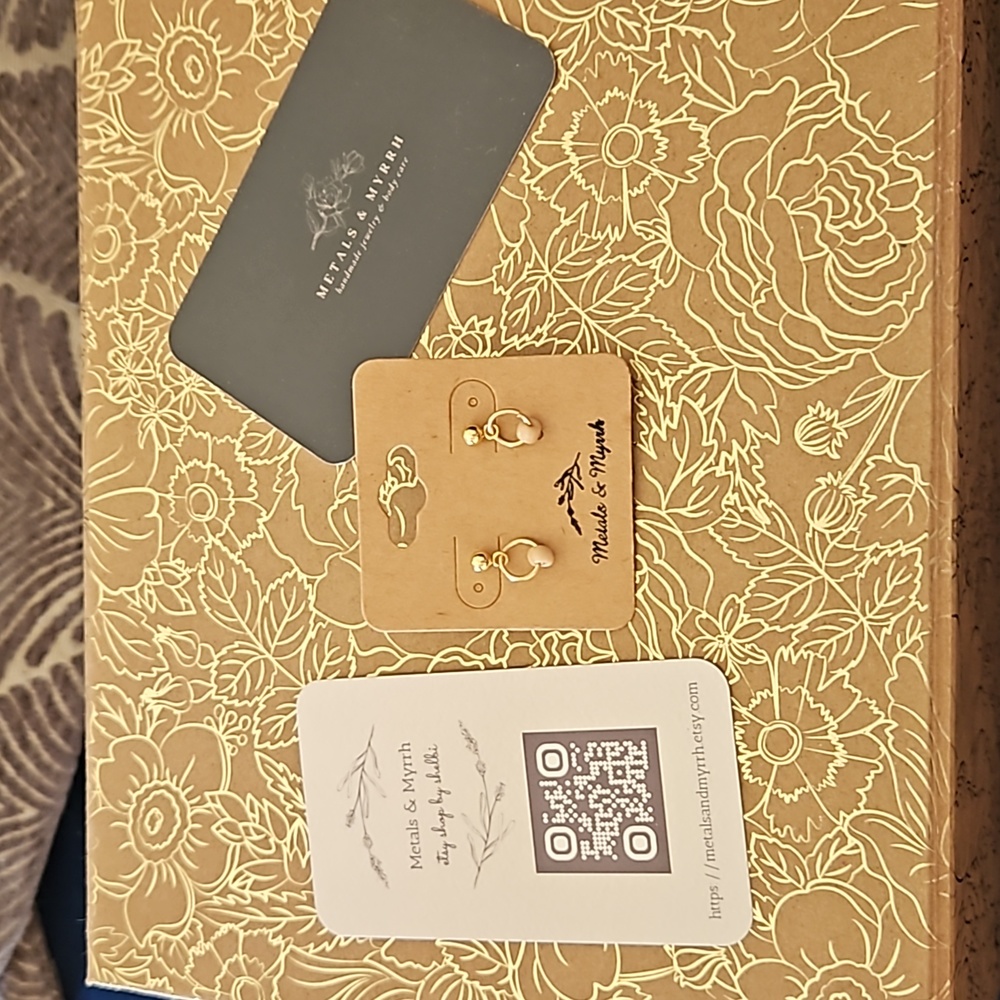 Gold earrings with danty tan bead